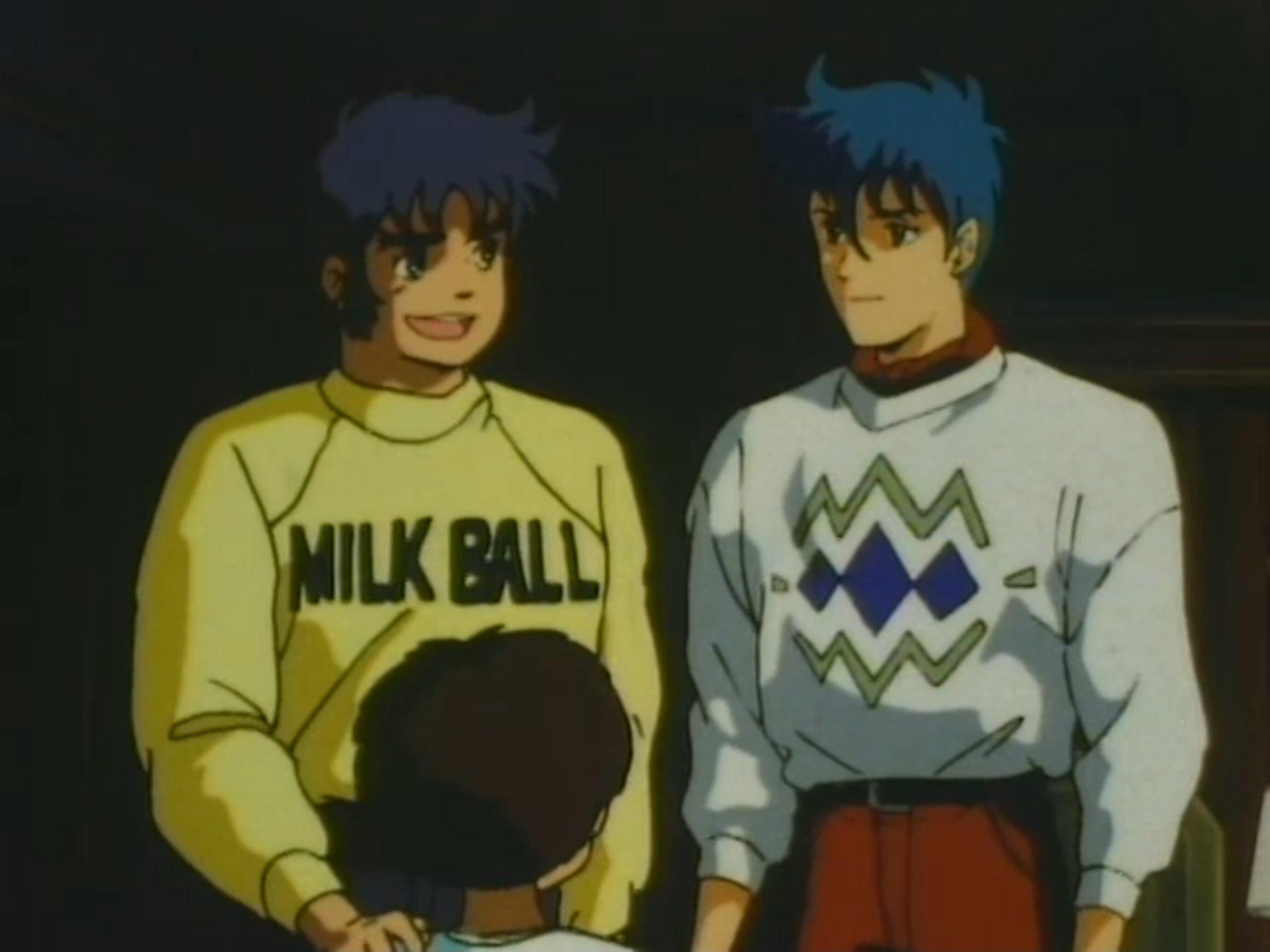 Kento from Ronin Warriors wearing a yellow sweater reading 'MILK BALL' talking with Rowen