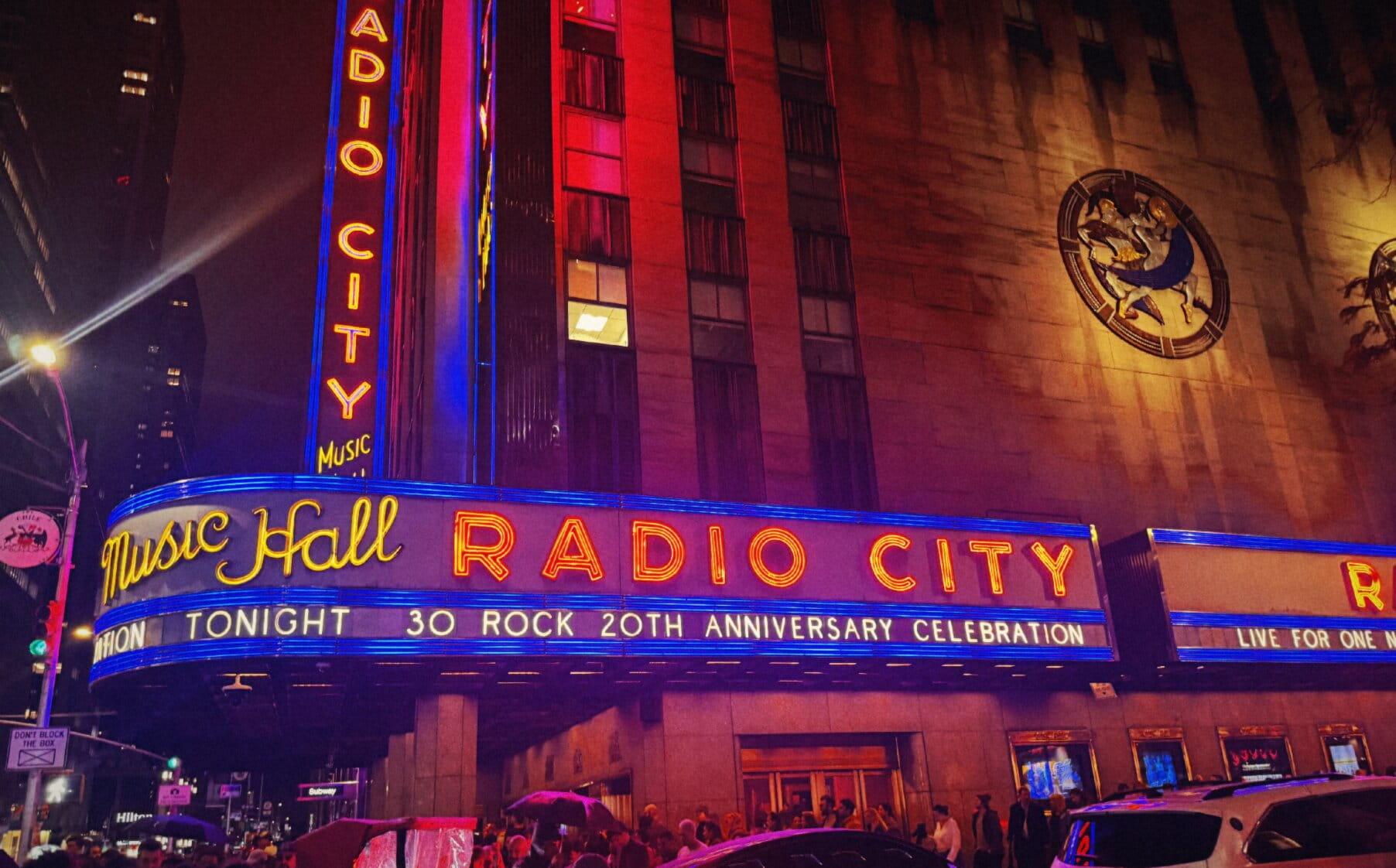 Radio City Music Hall with marquee reading 30 Rock 20th anniversary celebration